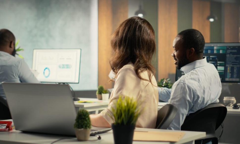 Team analysing financial insights using modern business analytics tools.