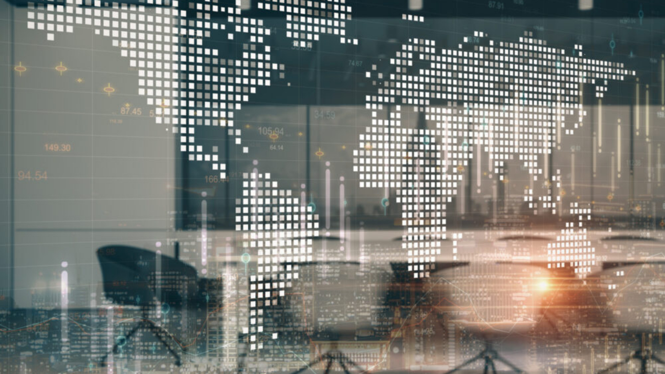 Blurred modern office with digital global map illustrating multi-country financial management with Sage Intacct