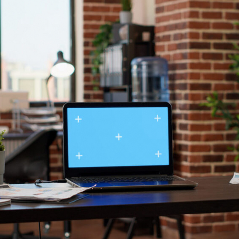 Office workspace with computer screens used during a Sage 200 upgrade and system update planning
